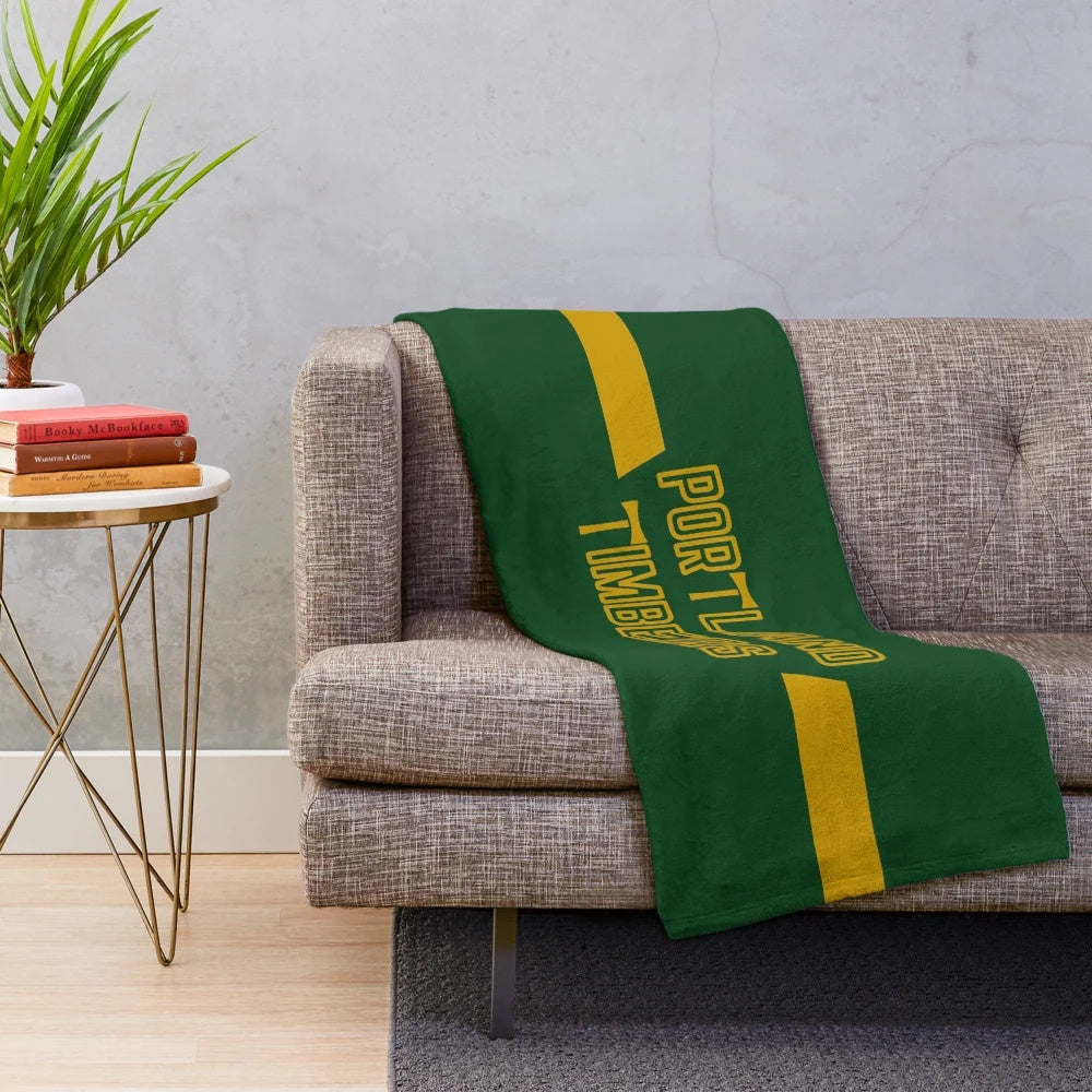Portland Timbers-inspired plush blanket with team colors and logo