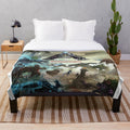 Ark video game inspired plush blanket featuring prehistoric animals
