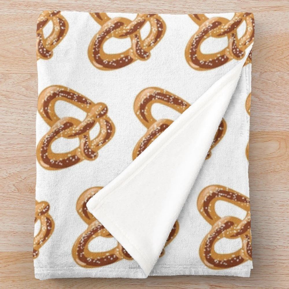 Soft plush pretzel-themed blanket with heart shapes