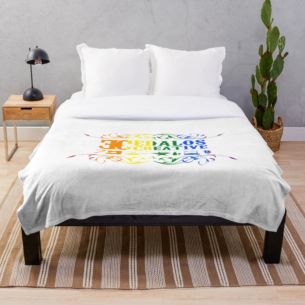 Vibrant pride logo on a soft, plush blanket
