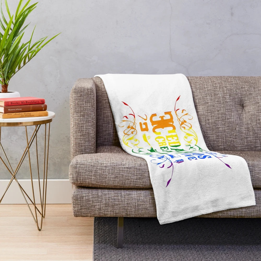 Vibrant pride logo on a soft, plush blanket