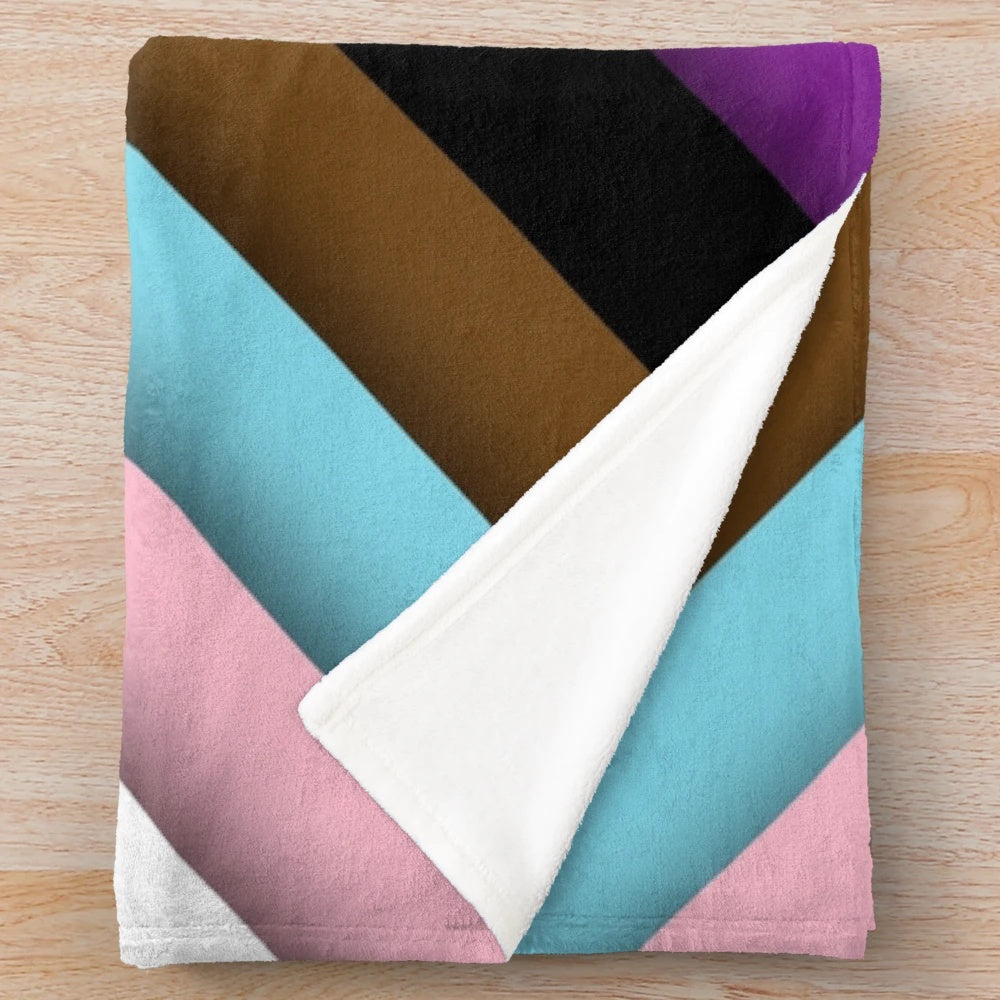 A soft and inviting plush blanket featuring the Progress Pride flag design