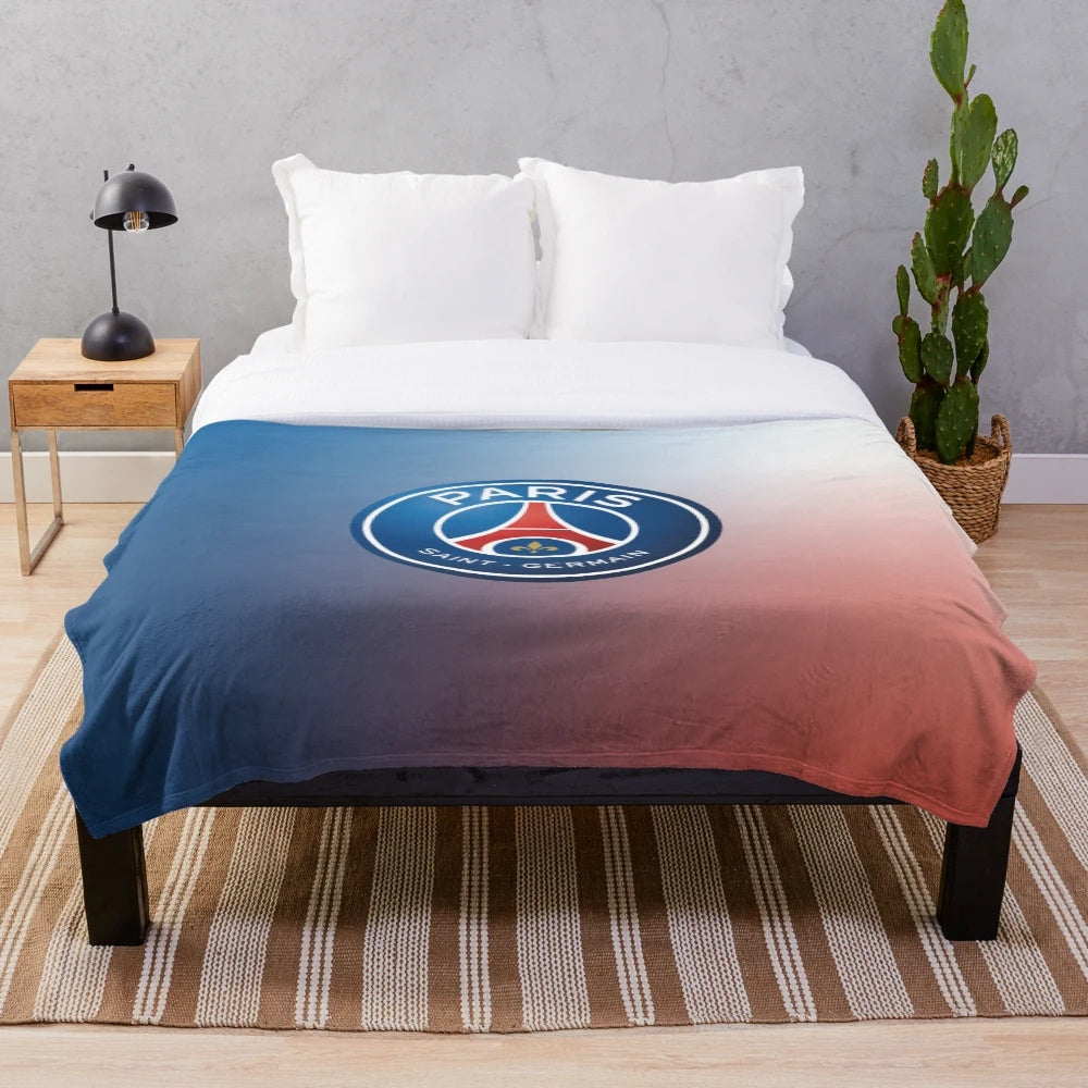 PSG-inspired plush blanket featuring the club's logo and colors