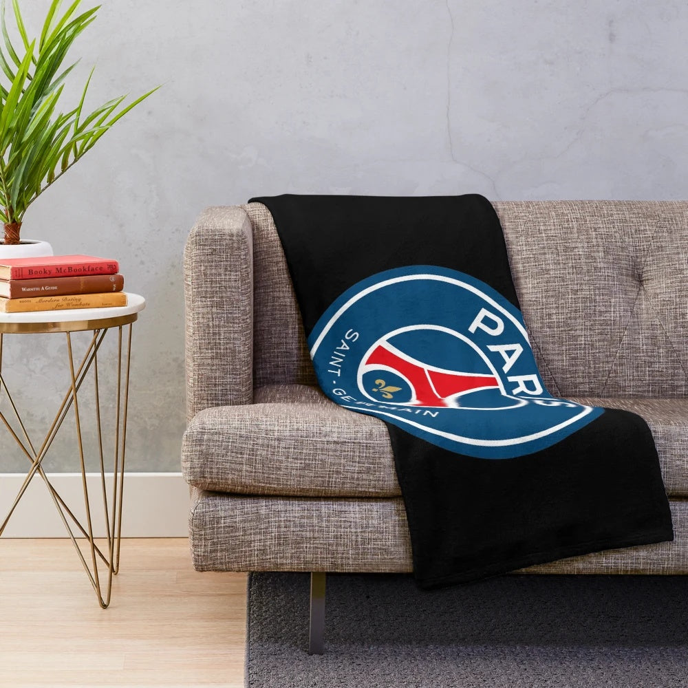 Plush blanket featuring the Paris Saint-Germain football club logo and colors