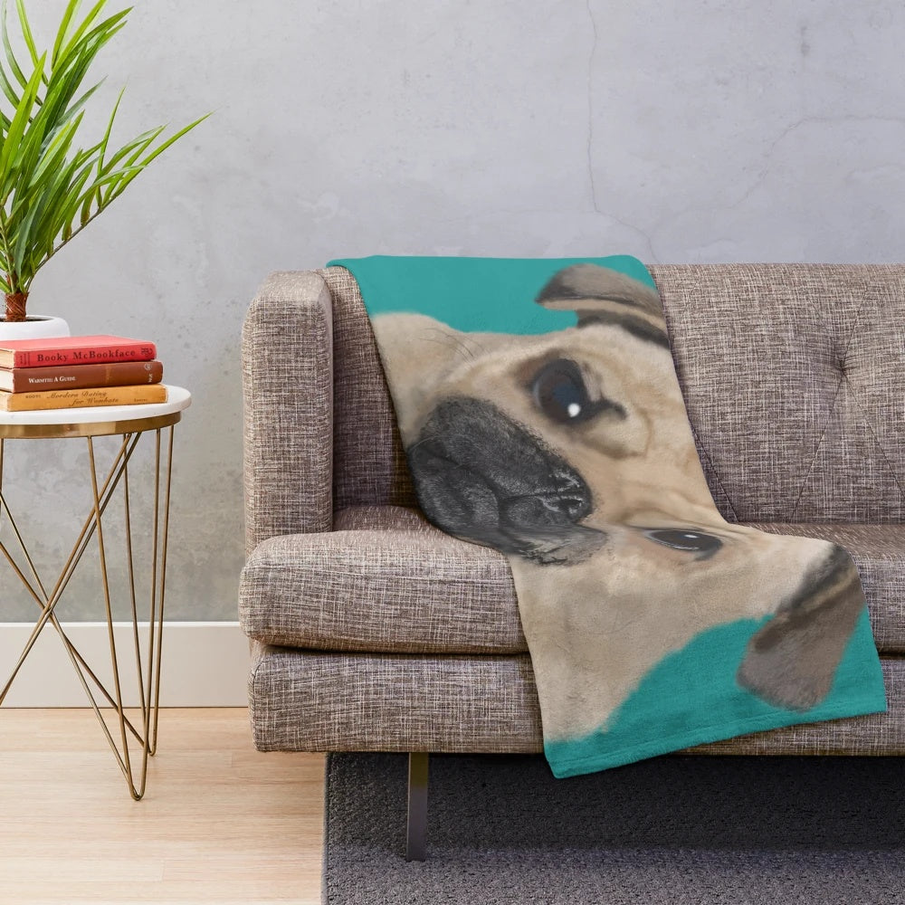Teal pug plush blanket with pug face design