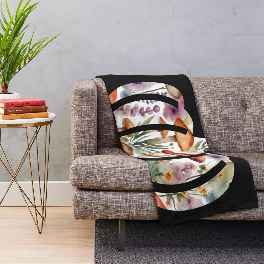 Pumpkin and floral watercolor design on a cozy plush blanket