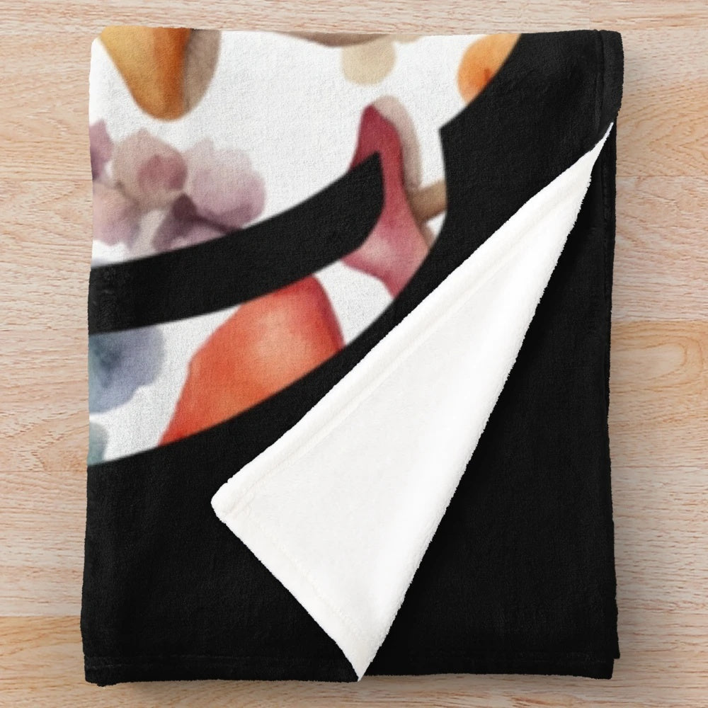 Pumpkin and floral watercolor design on a cozy plush blanket