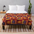 Pumpkin Patch Plush Blanket, featuring an orange and purple design for fall and Halloween