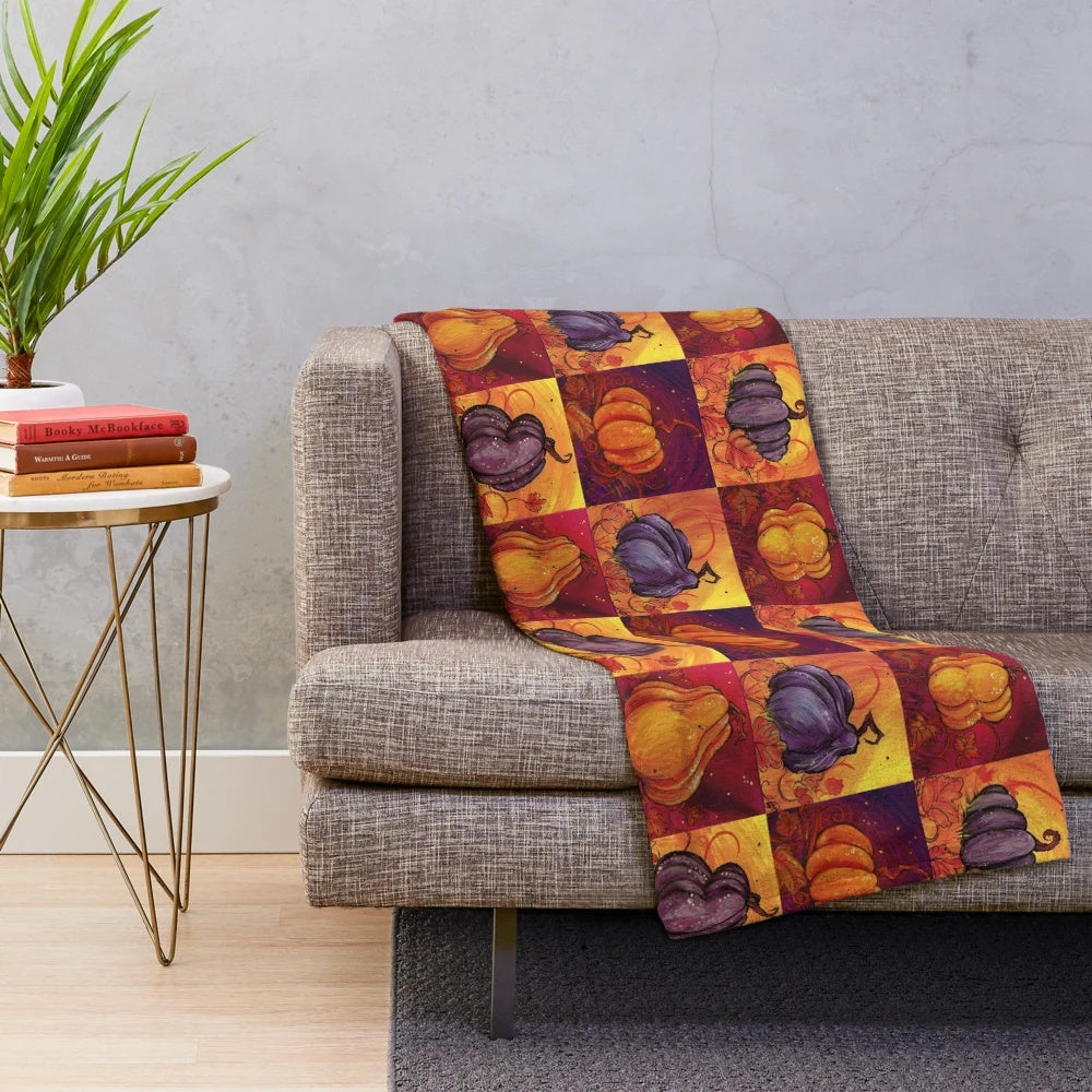 Pumpkin Patch Plush Blanket, featuring an orange and purple design for fall and Halloween