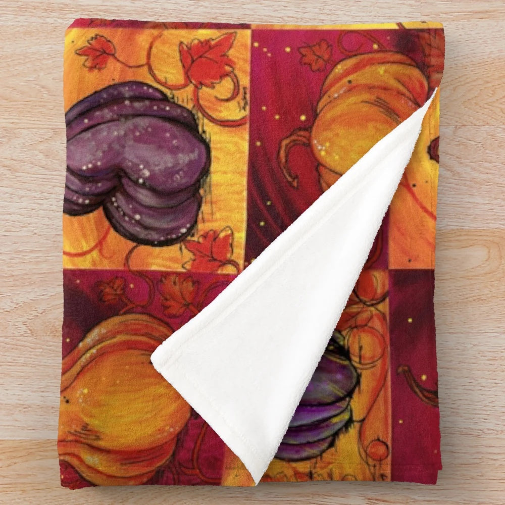 Pumpkin Patch Plush Blanket, featuring an orange and purple design for fall and Halloween