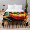 Soft and plush pumpkin-themed blanket for the fall season