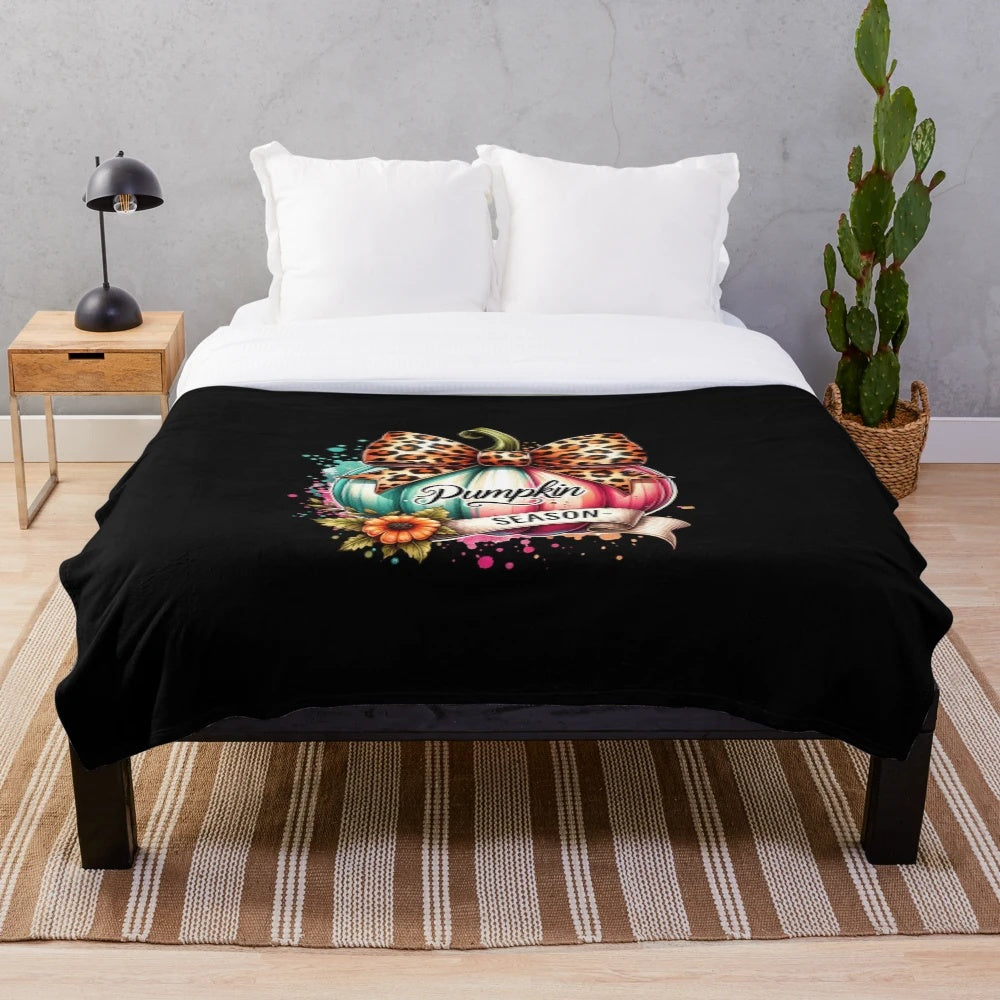 Retro pumpkin print plush blanket with fall season aesthetic