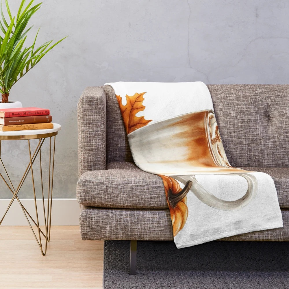 Pumpkin spice latte-themed plush blanket with fall leaves and cozy vibes