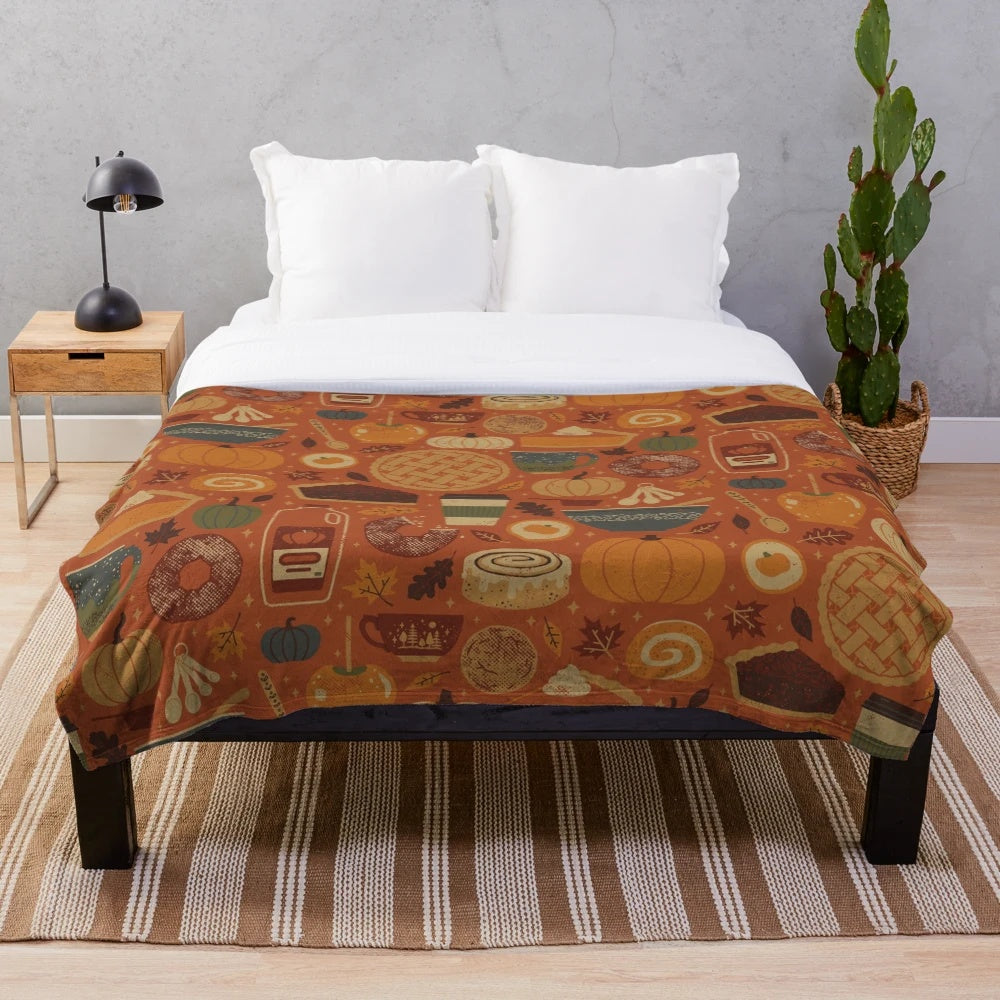 Pumpkin spice plush blanket in cozy fall colors
