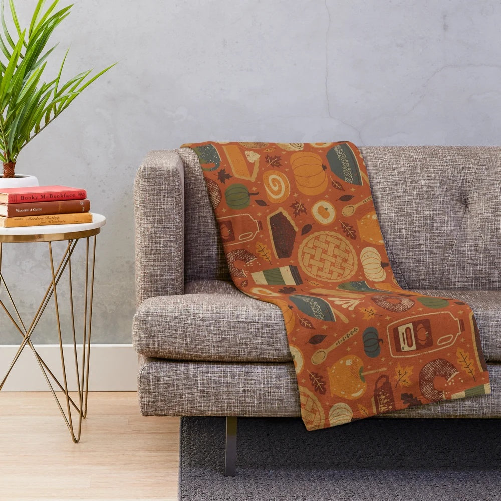 Pumpkin spice plush blanket in cozy fall colors