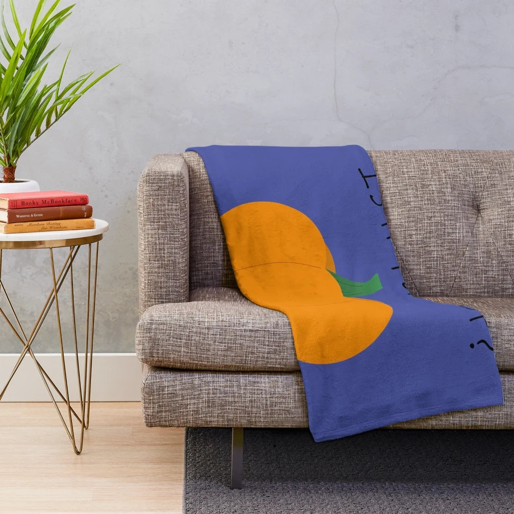 Warm and soft plush blanket in autumn pumpkin colors