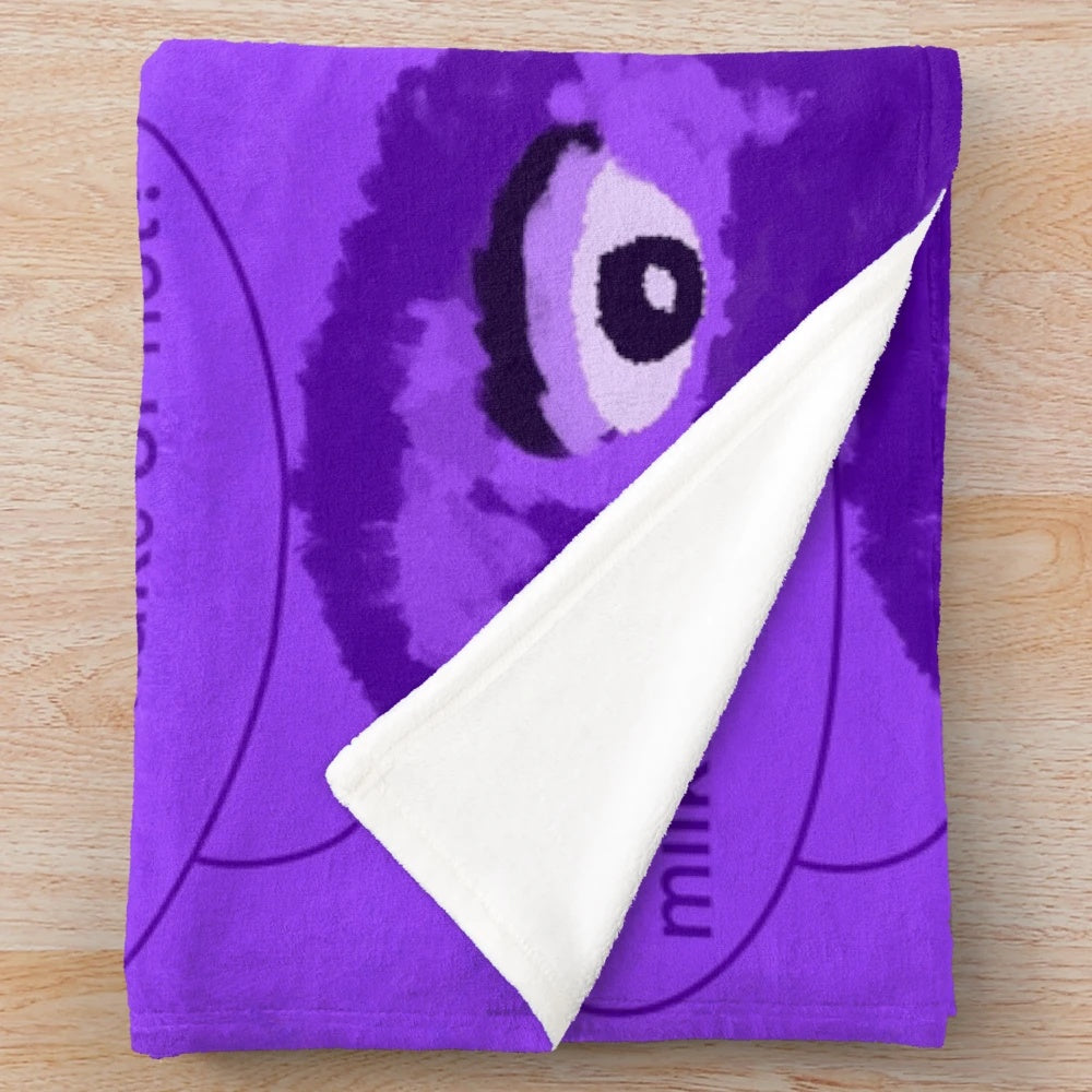 Grimace-inspired plush blanket with cute purple monster design