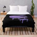Purple piano plush blanket with musical instrument design