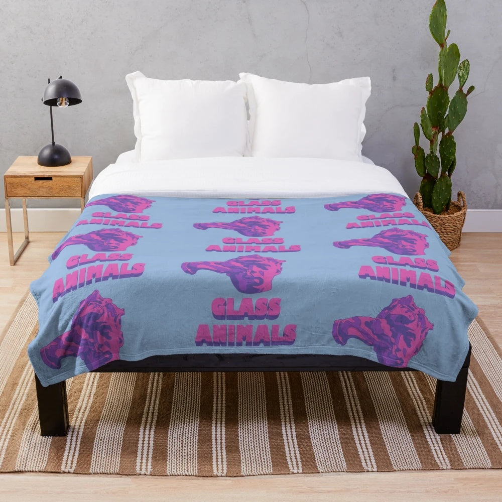 Purple plush blanket with Glass Animals head and logo design