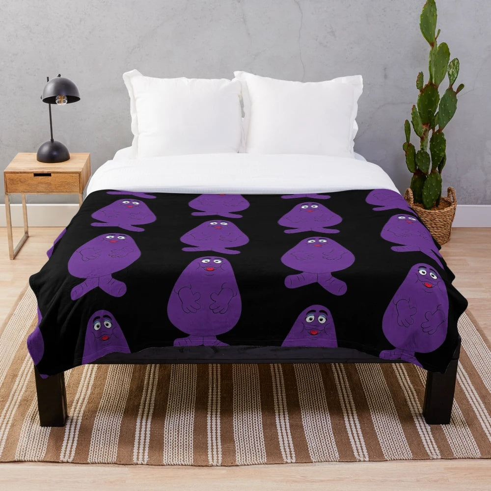 Purple plush blanket featuring iconic McDonald's cartoon character