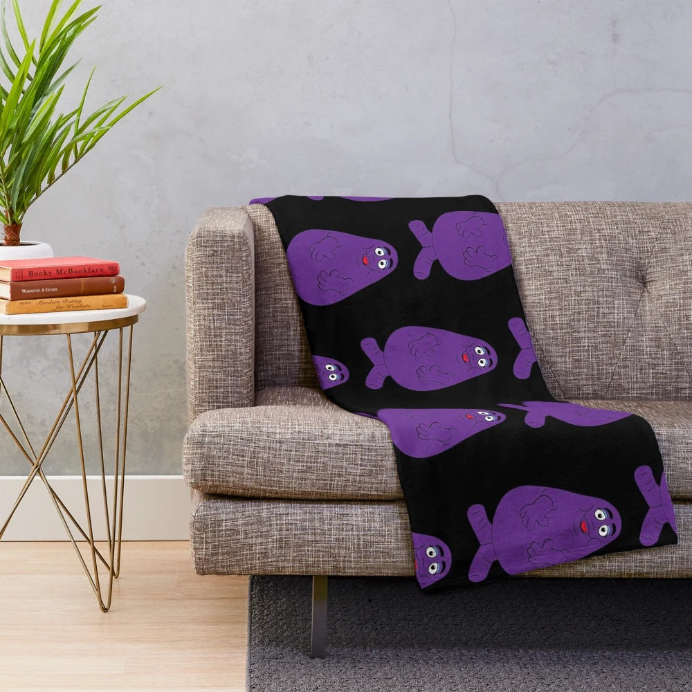 Purple plush blanket featuring iconic McDonald's cartoon character