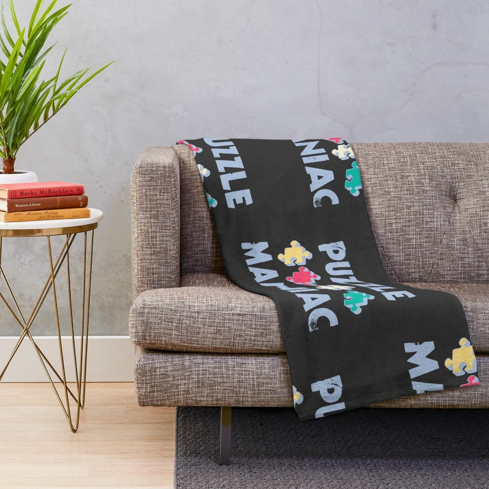 Puzzle Maniac Plush Blanket featuring a soft, comfortable design for puzzle enthusiasts