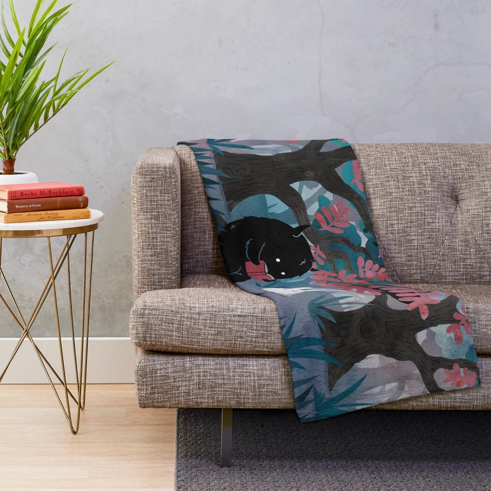 Watercolor-inspired plush blanket featuring a cute rabbit and forest scene