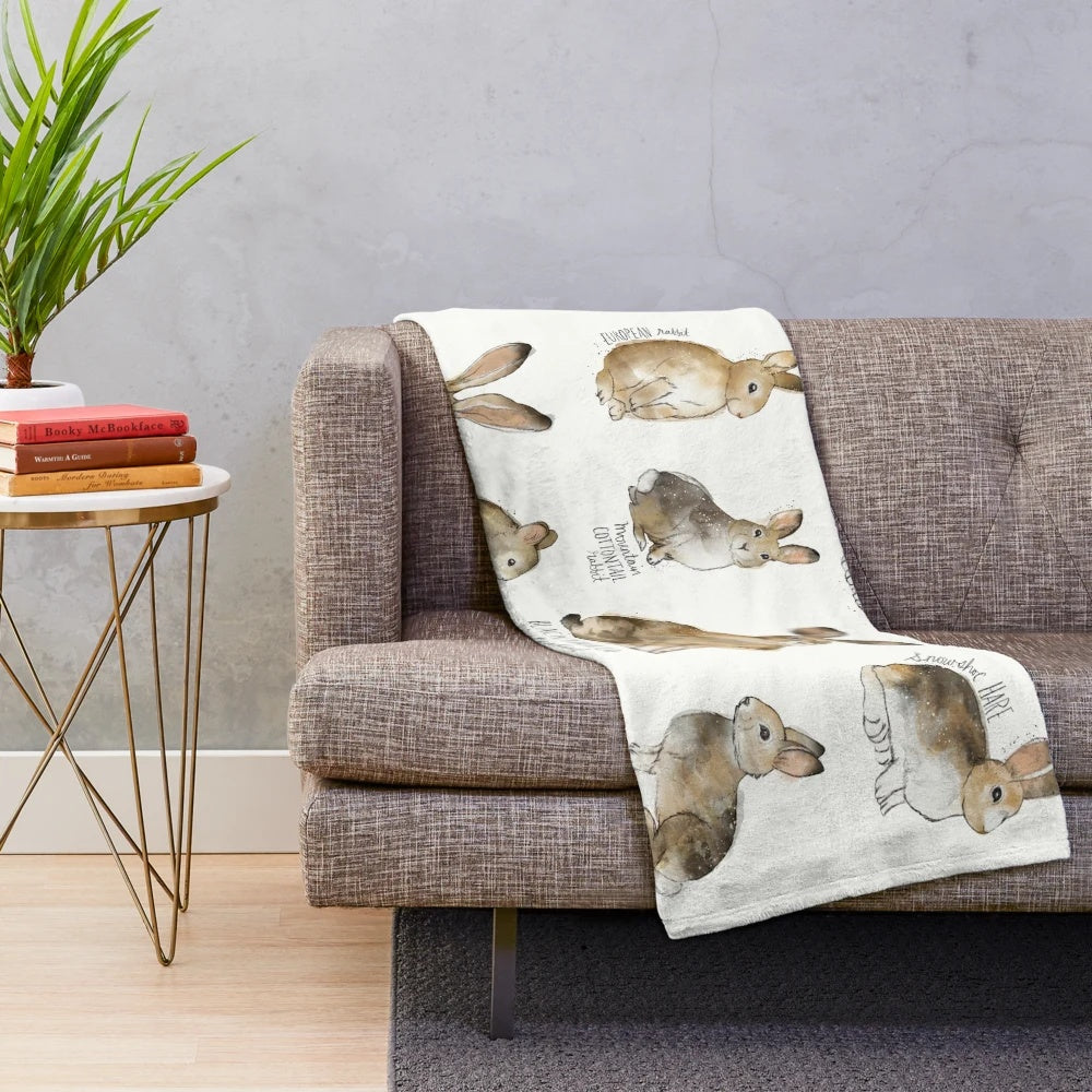Rabbits and hares plush blanket with woodland animal design