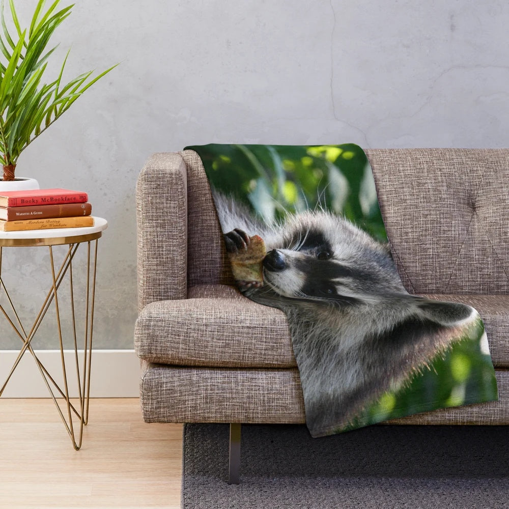 Adorable raccoon portrait on a plush blanket for home decor