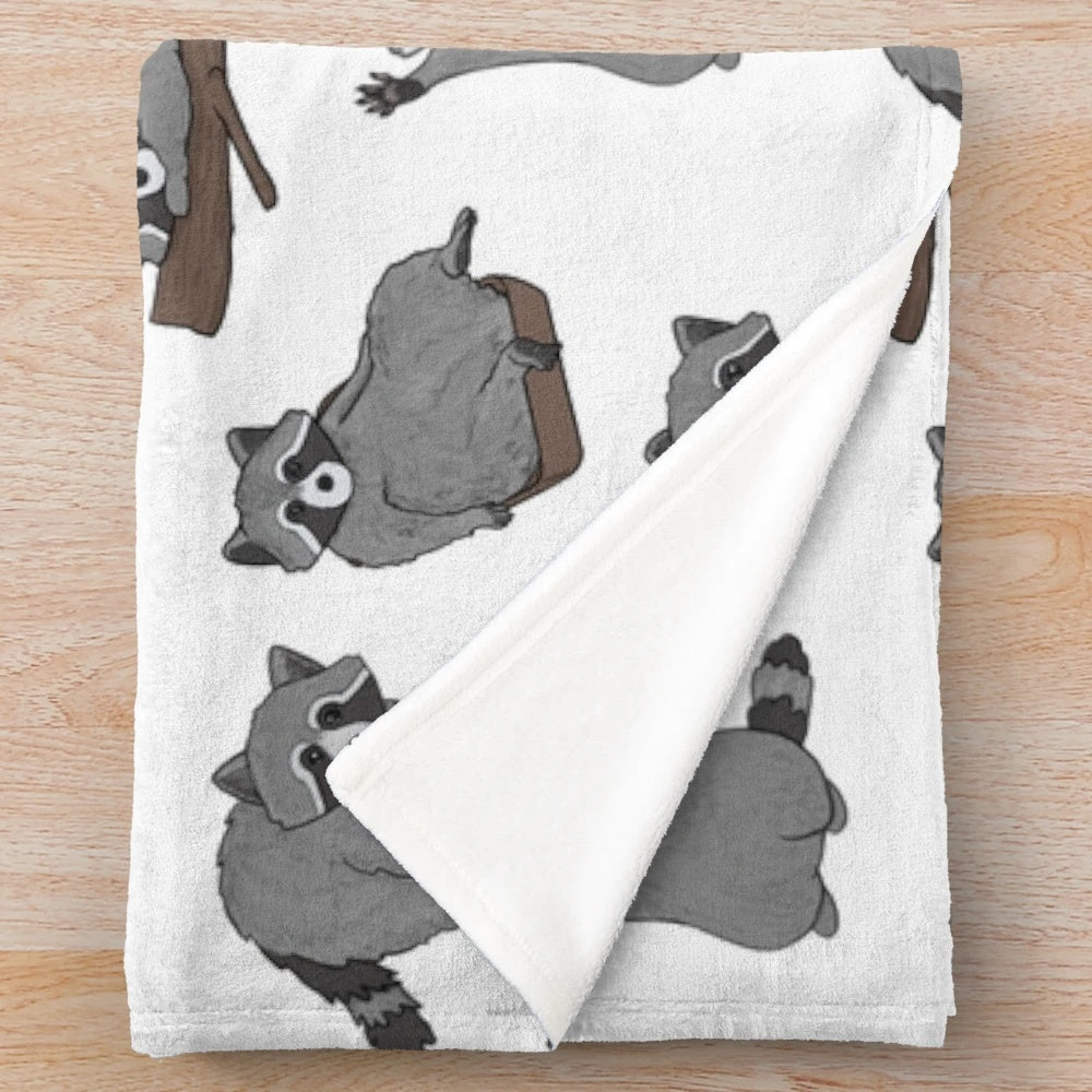 Soft and cuddly raccoon plush blanket