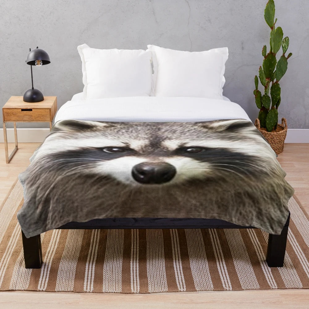 Soft and plush raccoon-patterned blanket