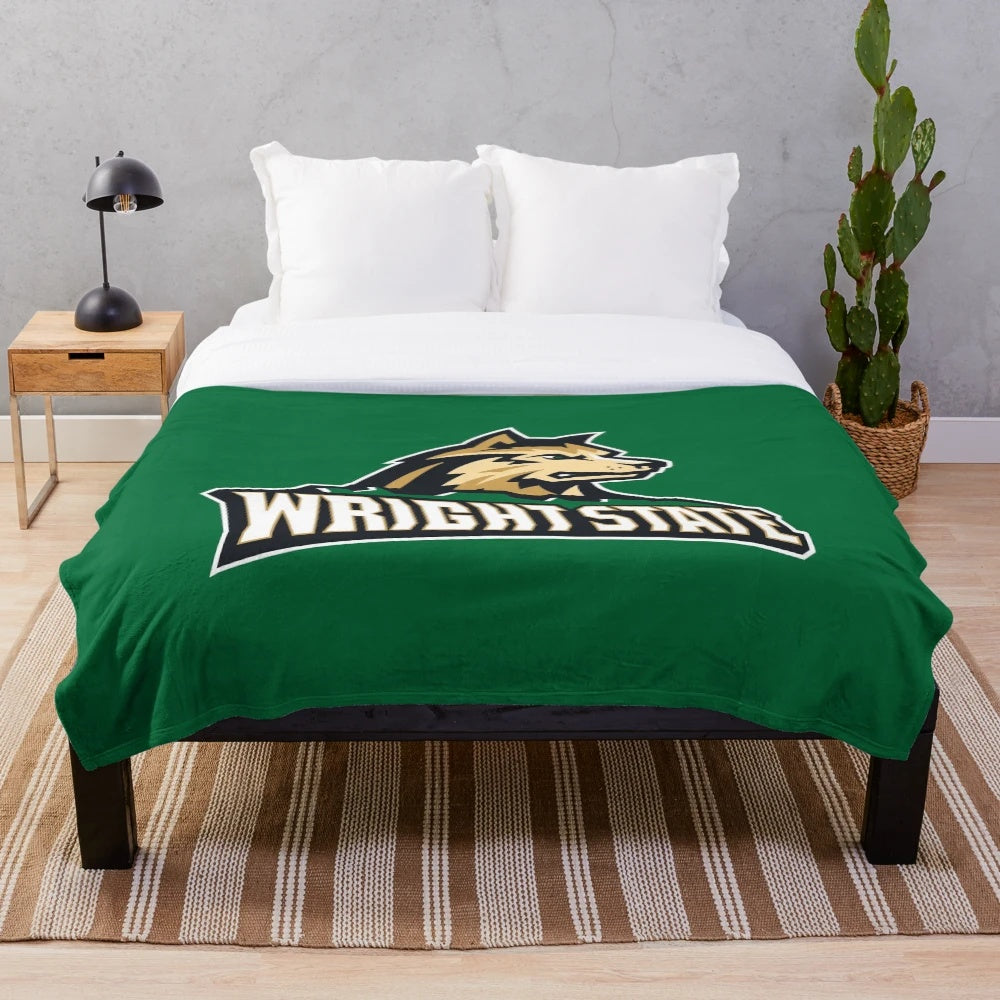 Raiders-themed plush blanket with team logo