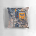A vibrant red pillow with a railroad or train theme, perfect for adding a touch of industrial chic to your home.