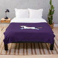 Rainbow-colored unicorn plush blanket