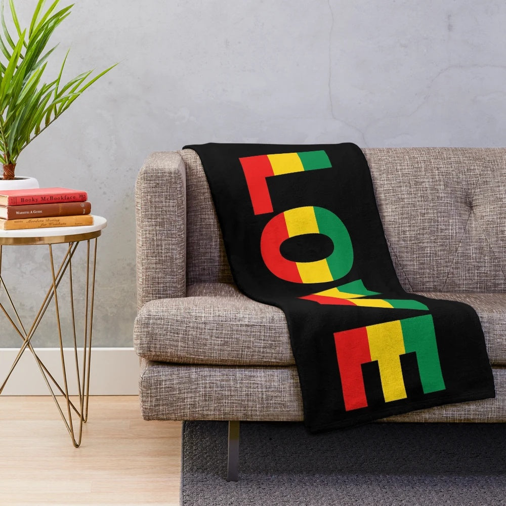 Rasta-inspired plush blanket with Jamaican reggae and peace symbols