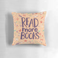 A white pillow with the text "Read More Books" in a stylish font