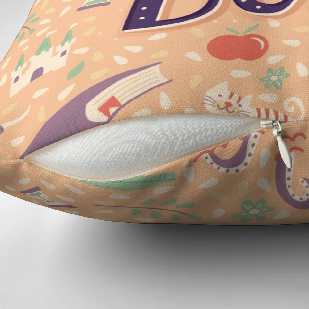 A white pillow with the text "Read More Books" in a stylish font