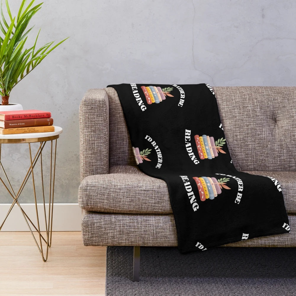 Plush blanket with "I'd Rather Be Reading" design, great gift for book lovers