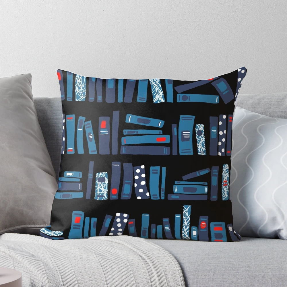 Black decorative pillow with a book-themed pattern, perfect for readers and book enthusiasts.