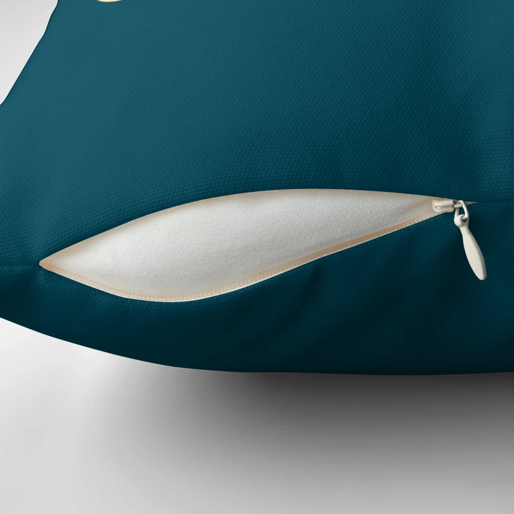 A plush, blue pillow with the text "I Read Past My Bedtime" printed on it.