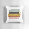 Plush pillow with a stack of books design, perfect for book enthusiasts and avid readers.