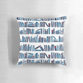 A plush reading pillow with a blue and red book pattern, perfect for cozy reading sessions.