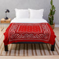 Red bandana-patterned plush blanket