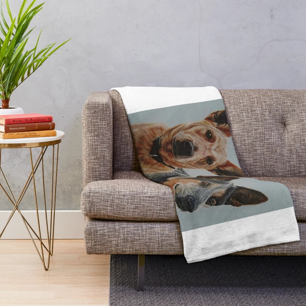 Plush blanket featuring a painting of red and blue Australian cattle dogs
