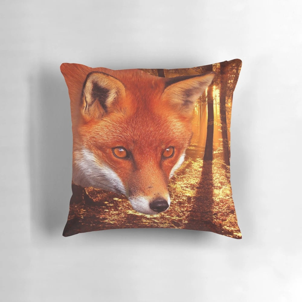 A vibrant red fox sitting in an autumnal forest surrounded by trees and leaves