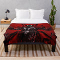 Red monster plush blanket featuring a horror movie-inspired character