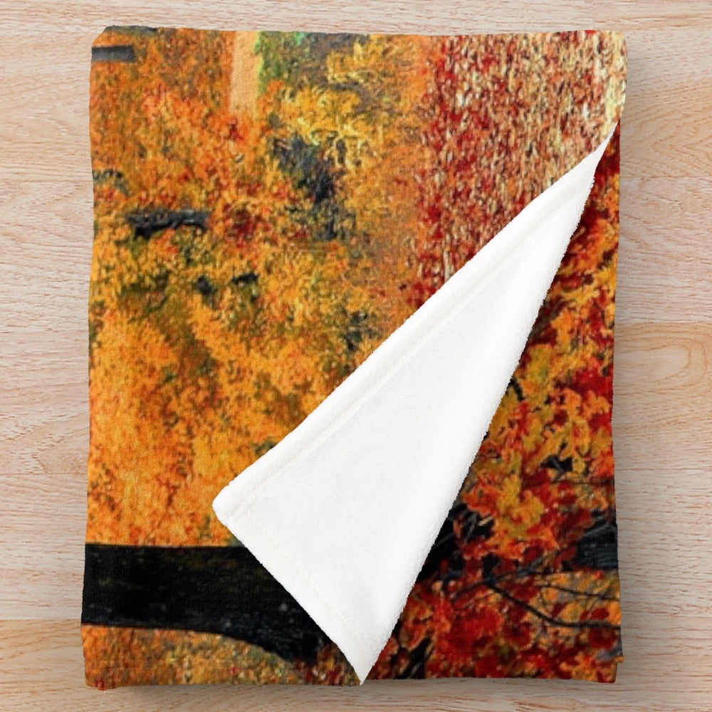 Red orange autumn plush blanket with forest and nature design