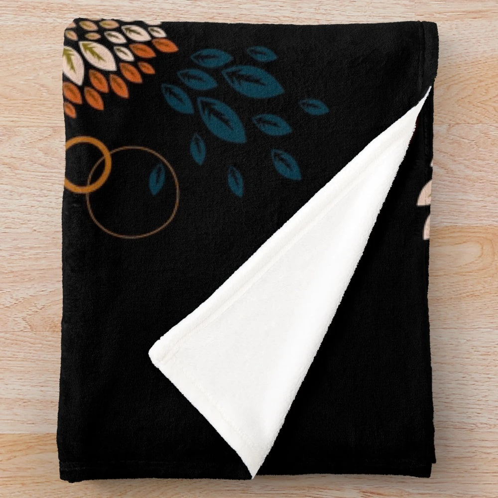 Red panda face plush blanket with geometric pattern and autumn leaves