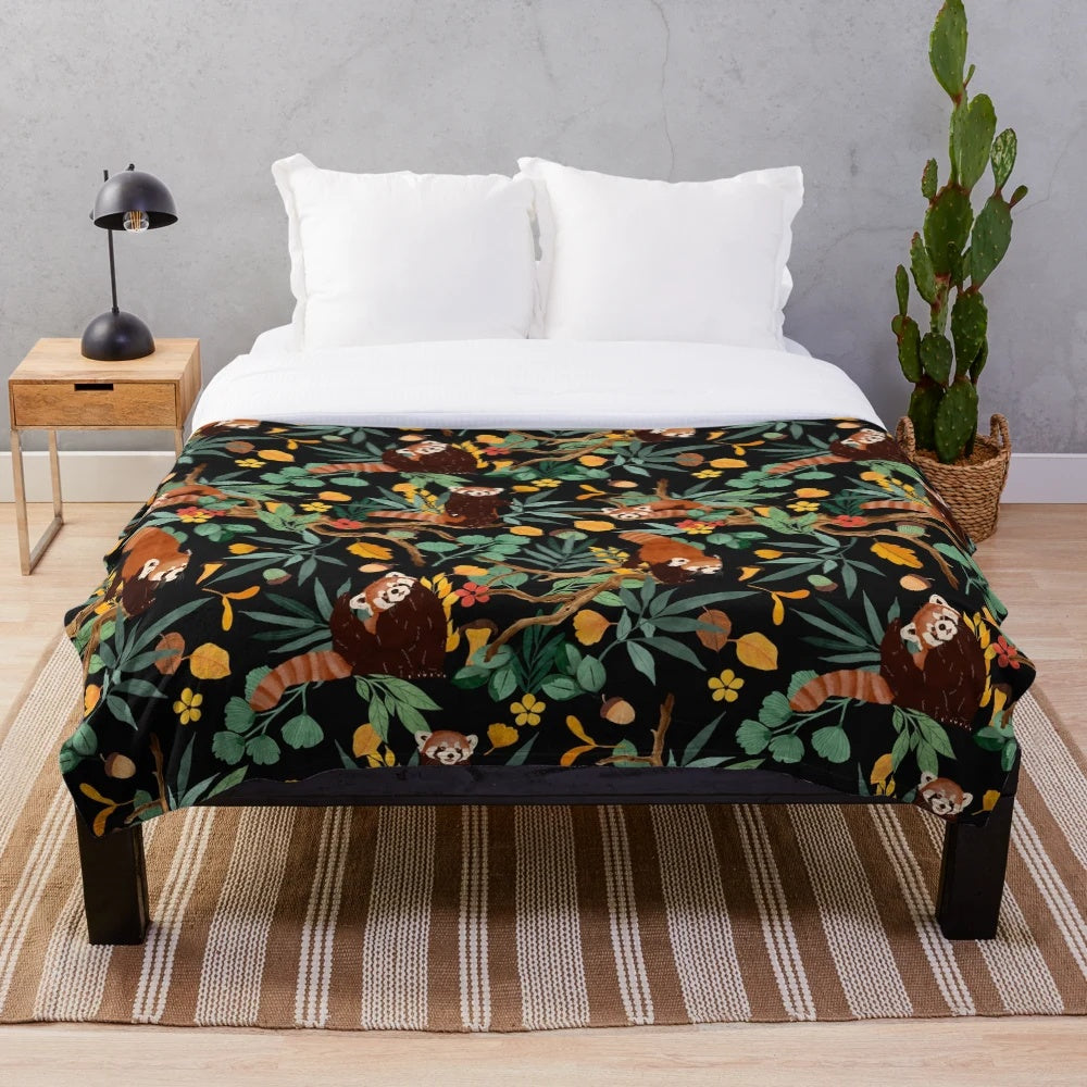 Vibrant red pandas nestled in a dark, lush forest on a plush blanket