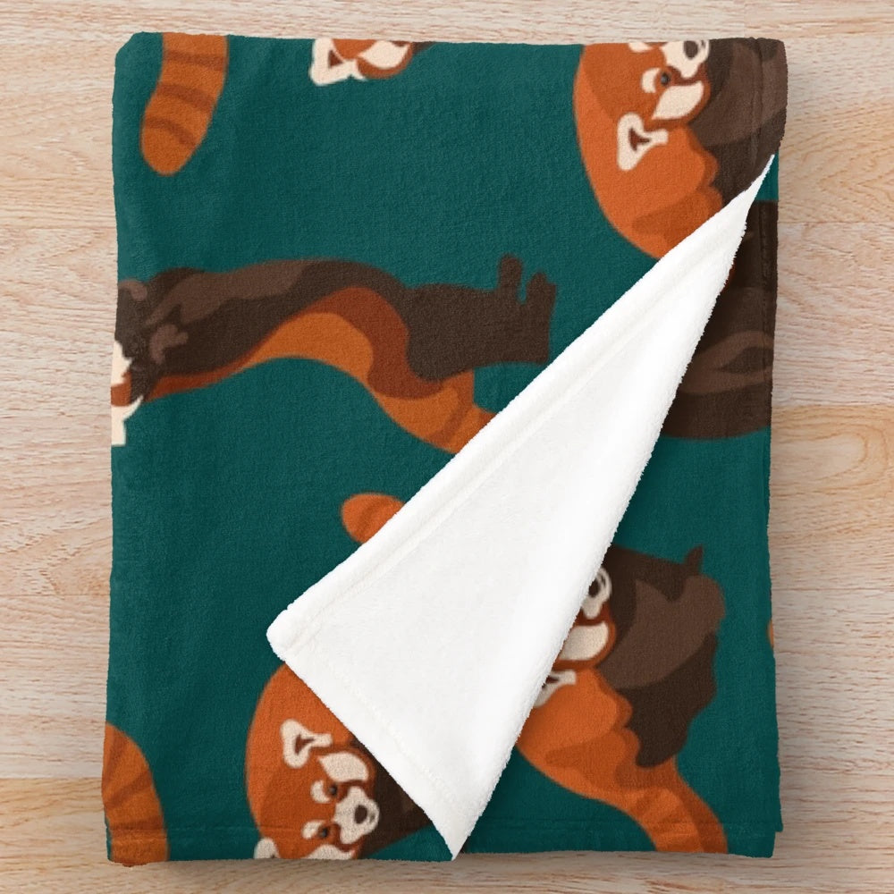 A soft and cozy red panda pattern plush blanket for home decor